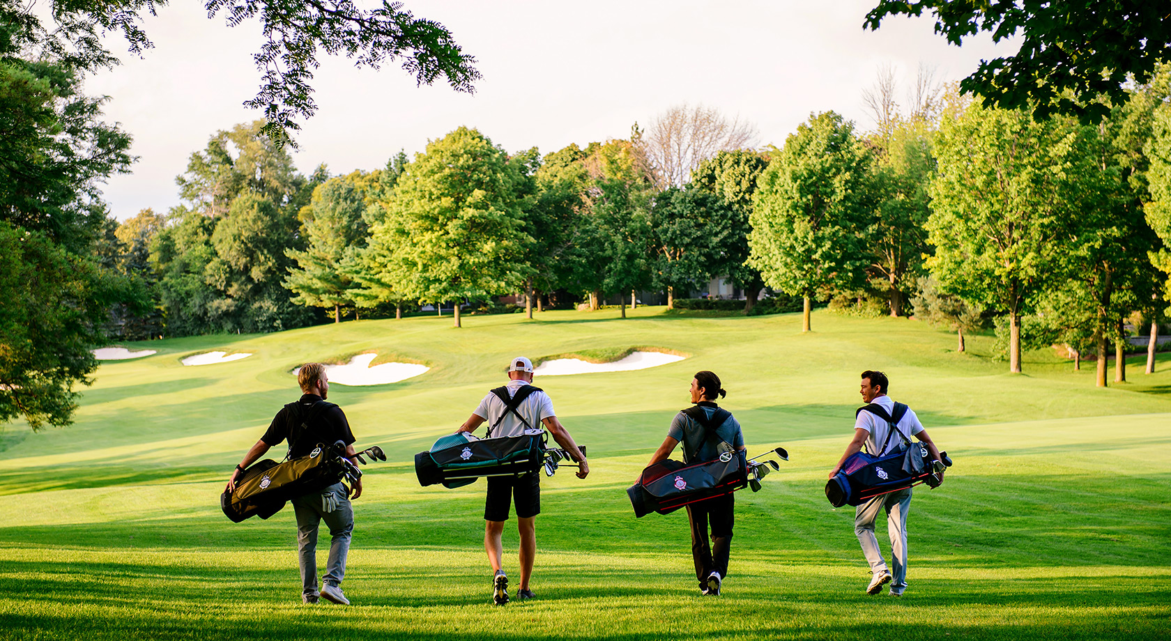 Players walking the golf course